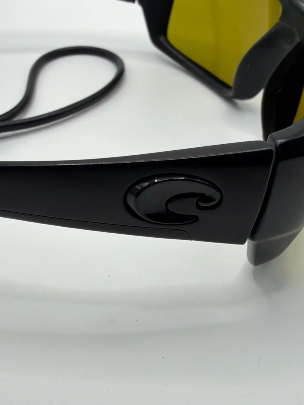 Costa Black Frame Sunglasses with Yellow Lenses